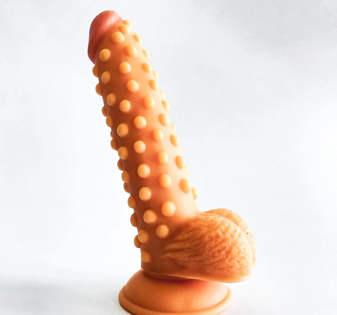 Pénis flexible en silicone avec boutons